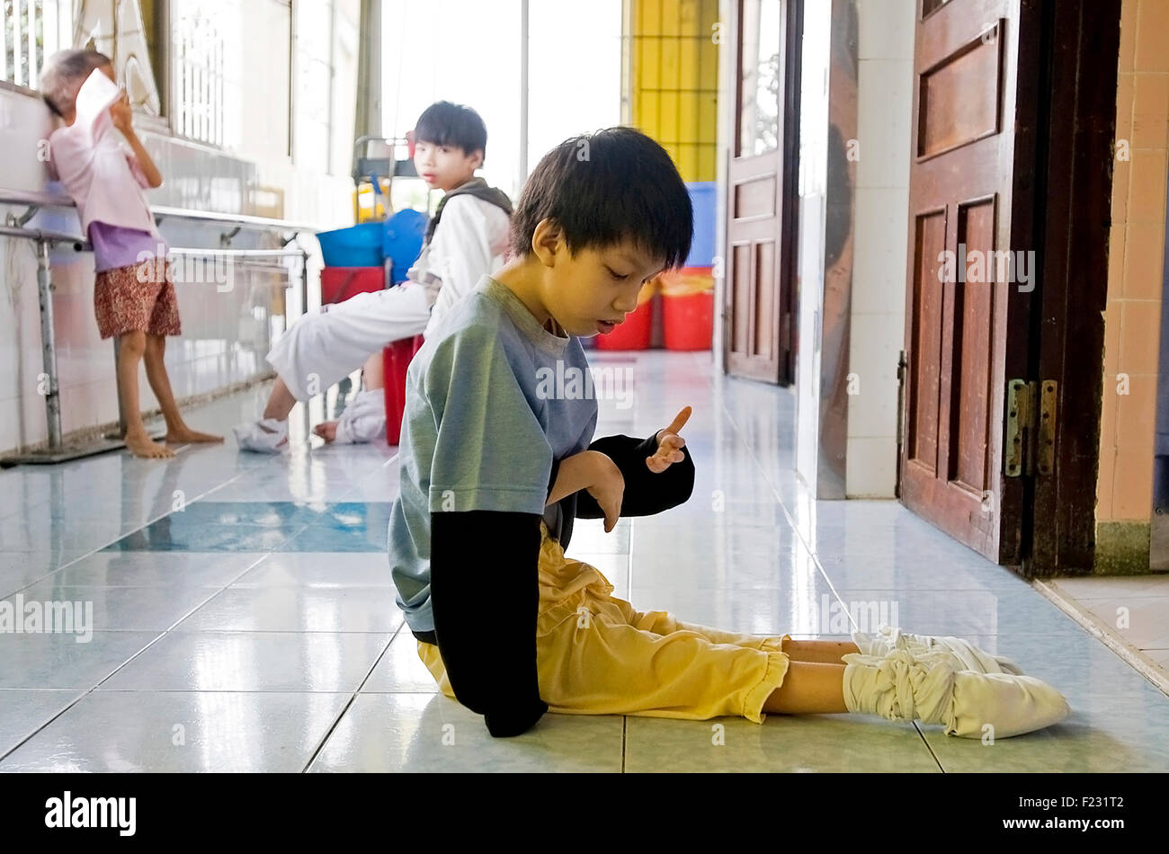 Disabled children believed to be affected by Agent Orange at Peace Village at Tudu Hospital, Ho Chi Minh City, Vietnam. Stock Photo