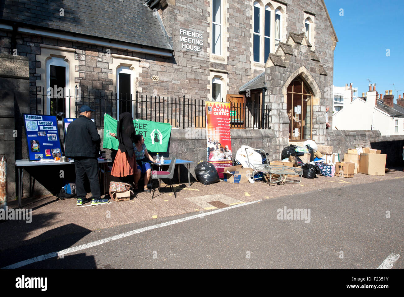 Exeter, UK. 10th Sep, 2015. The welcoming stall outside the Exeter Quaker Meeting hall at the Exeter Calais Solidarity collection for refugees living in 'The Jungle' refguee camp in Calais Credit:  Clive Chilvers/Alamy Live News Stock Photo