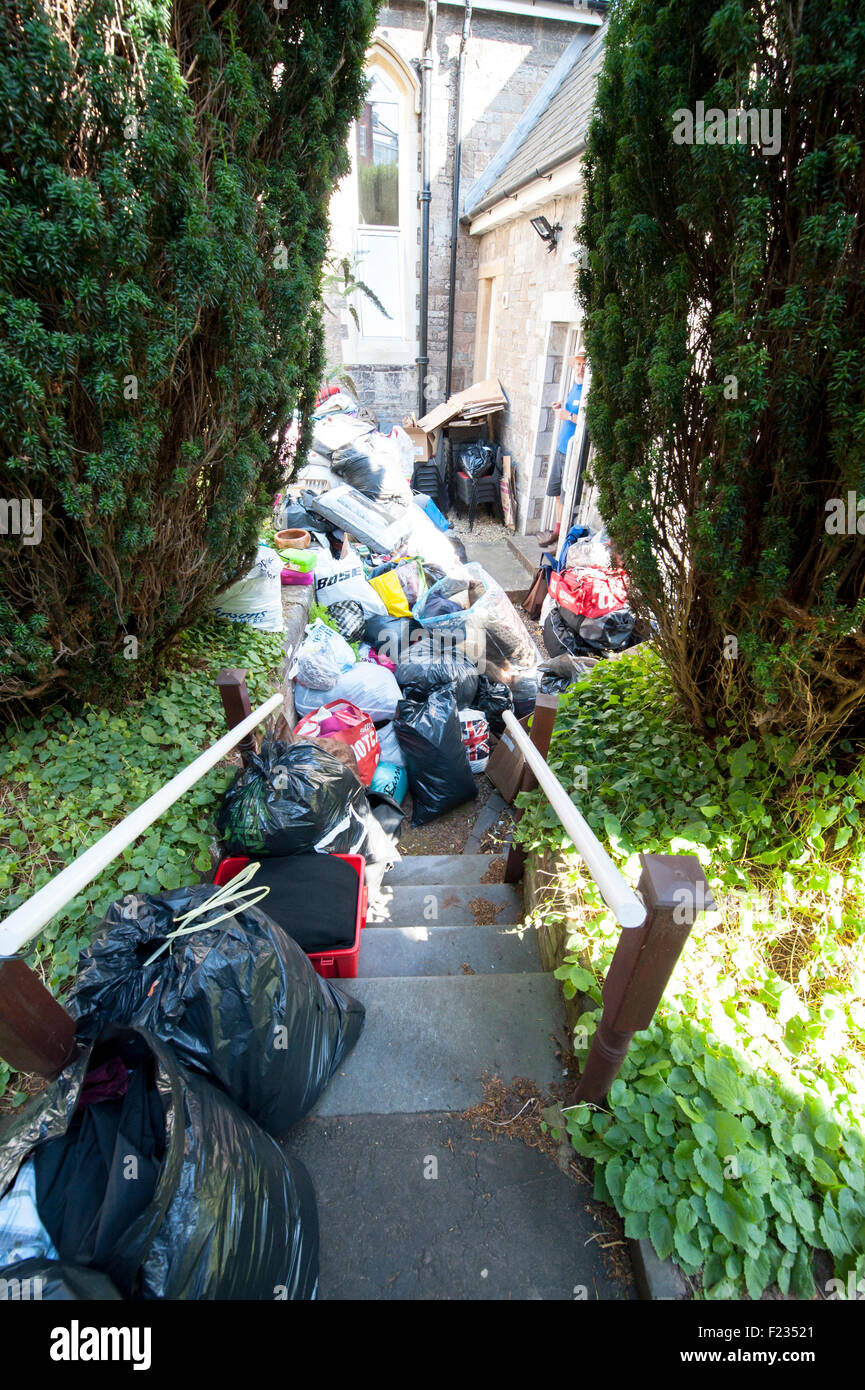 Exeter, UK. 10th Sep, 2015. The donated clothes reached up the steps at the rear of the Quaker Hall during the Exeter Calais Solidarity collection for refugees living in 'The Jungle' refguee camp in Calais Credit:  Clive Chilvers/Alamy Live News Stock Photo