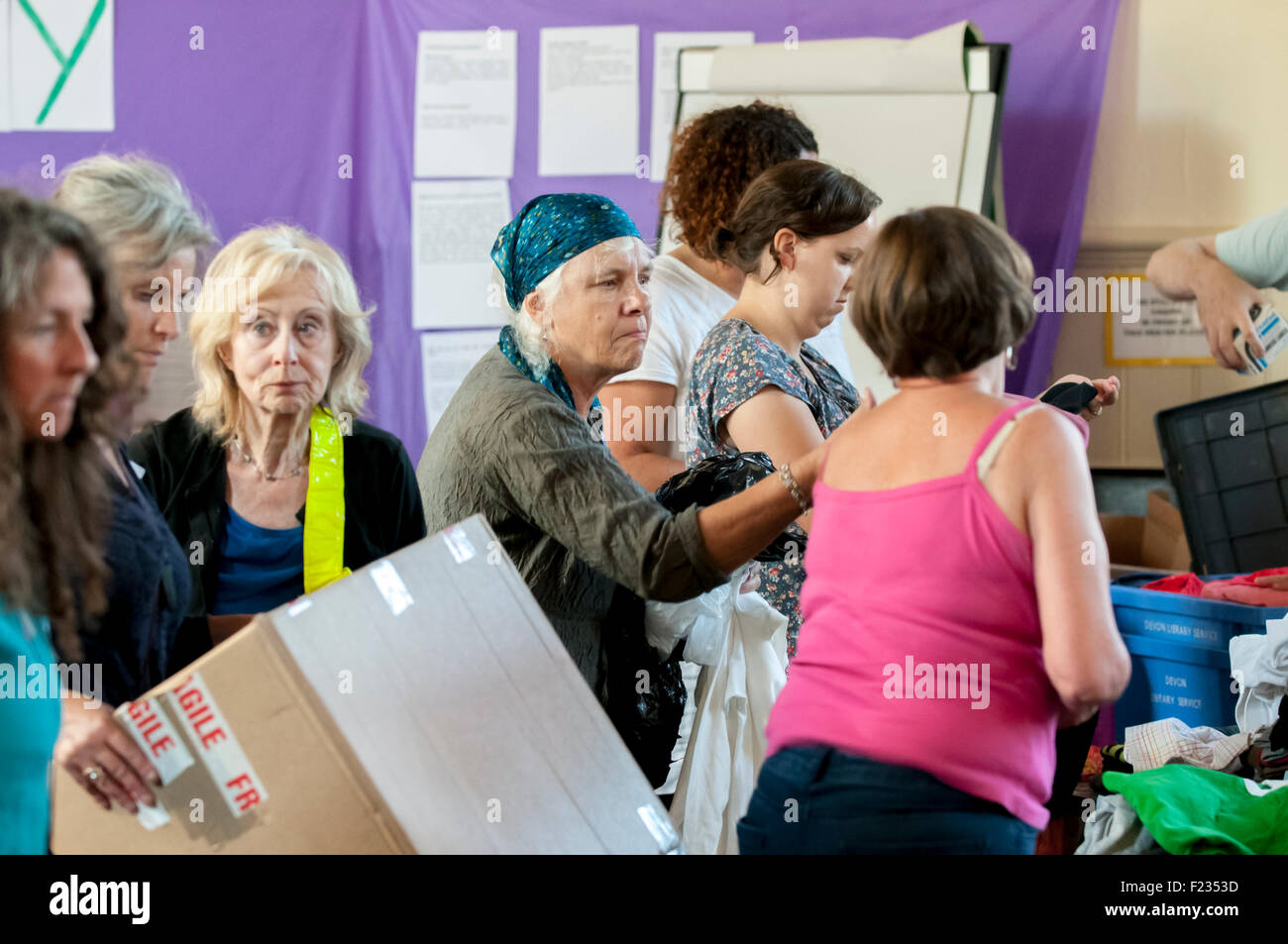 Exeter, UK. 10th Sep, 2015. Volunteers in action during the Exeter Calais Solidarity collection for refugees living in 'The Jungle' refguee camp in Calais Credit:  Clive Chilvers/Alamy Live News Stock Photo