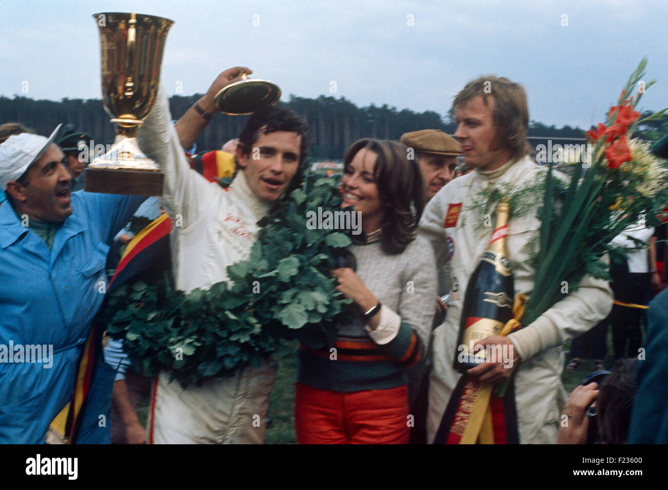 Jacky Ickx and Ronnie Peterson celebrating on the podium 1970s Stock Photo