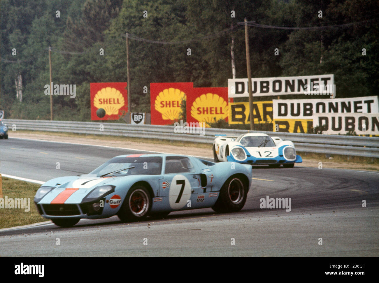 7 David Hobbs Mike Hailwood Gulf JW team Ford GT40 finished 3rd, 12 is Porsche 917 Langheck Longtail driven by Vic Elford and Richard Attwood, Le Mans 15th June 1969 Stock Photo