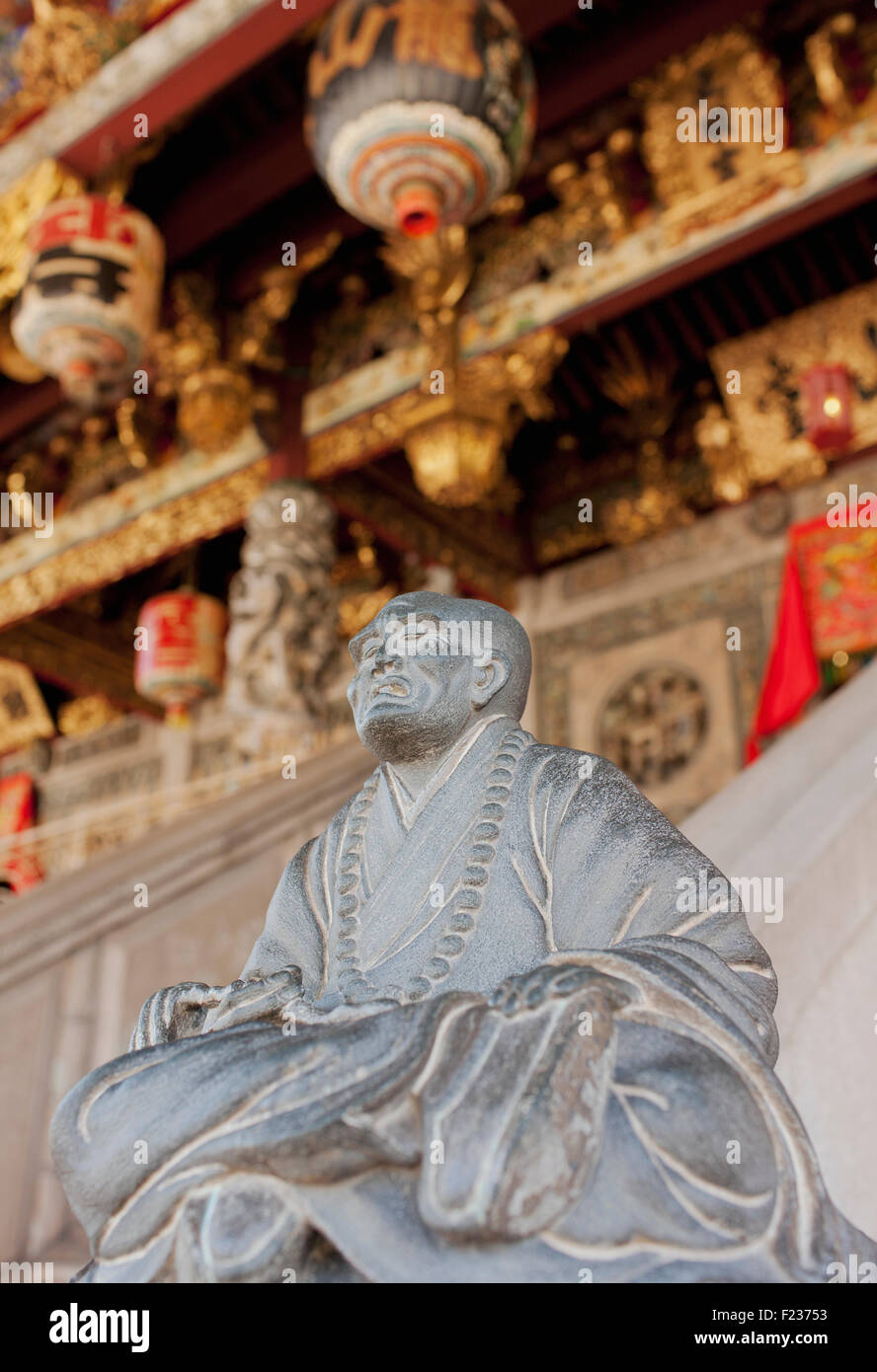 A stone Buddha statue at the entrance of the The Khoo Kongsi Clan House. Georgetown, Penang, Malaysia Stock Photo
