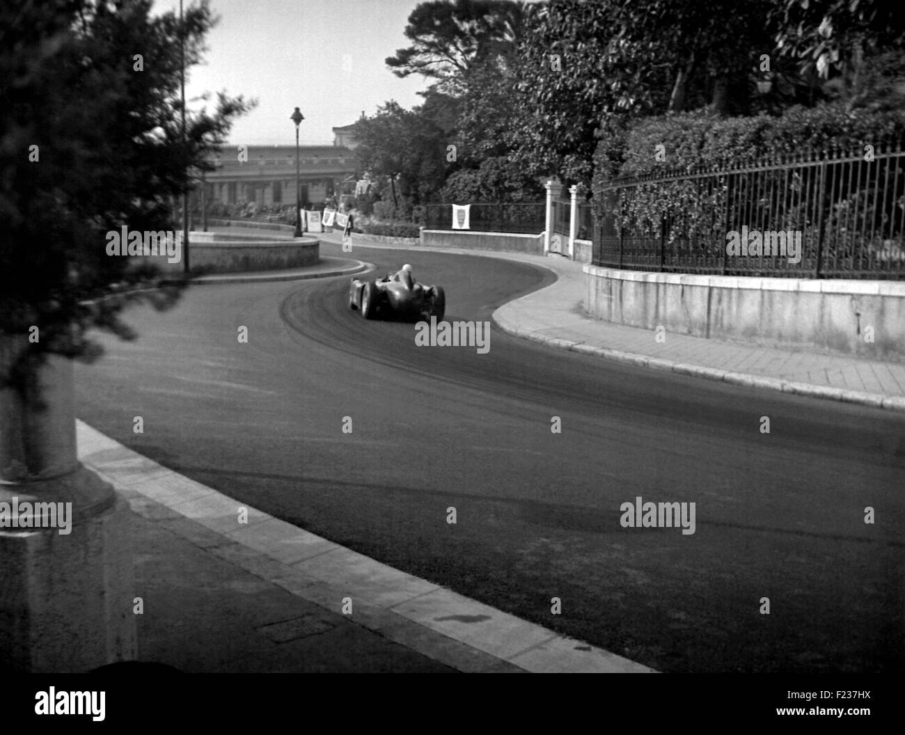 Lancia approaching Station Hairpin Monaco GP Monte Carlo 1955 Stock Photo