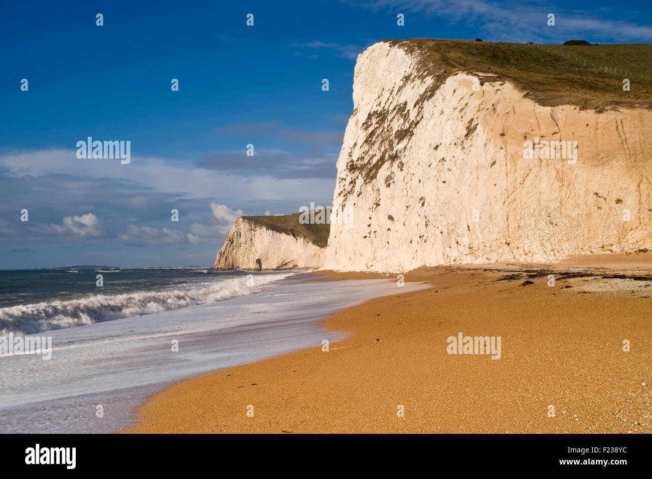 Looking along the beach towards Swyre Head and Bats Head on Dorset's Jurassic Coast near Lulworth, Dorset, UK. Stock Photo