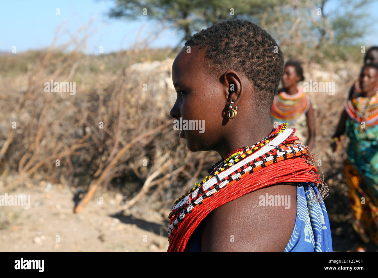 A girl from Samburu tribe in traditional clothes, in a local village at Kenya Stock Photo