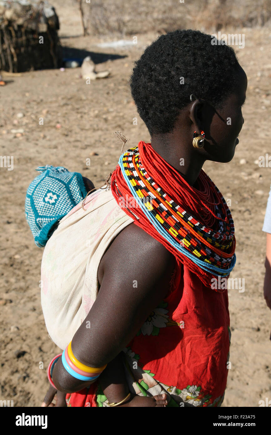 African girl and baby from Samburu tribe in a local village of Kenya Stock Photo