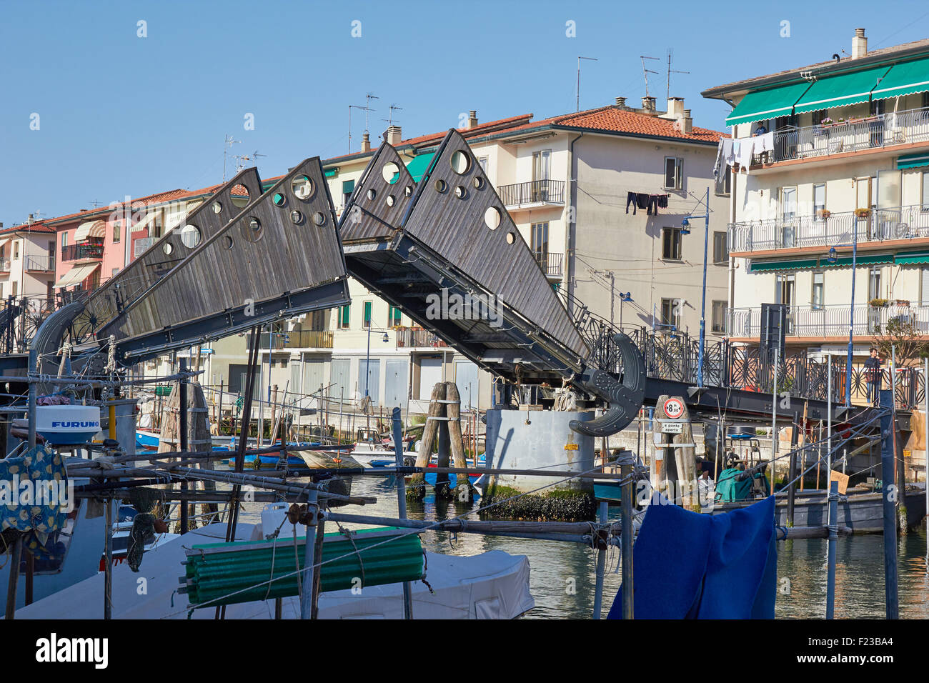 A wooden footbridge closing after boats have passed through Chioggia Venetian Lagoon Veneto Italy Europe Stock Photo