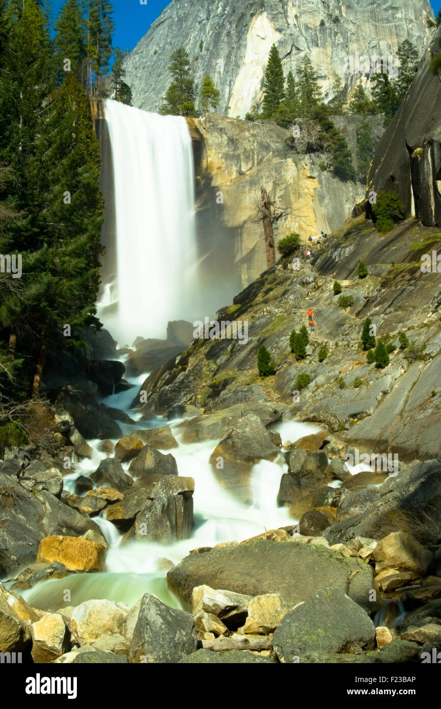 Water falling from rocks in a river, Yosemite Mist Trail, Vernal Falls, Yosemite National Park, California, USA Stock Photo