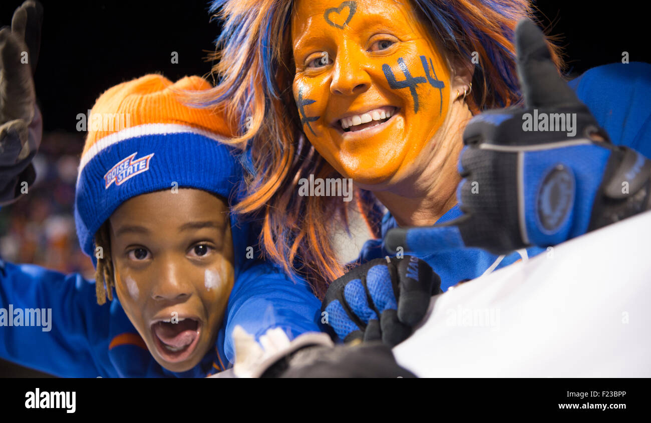 Football fans cheering football game hires stock photography and