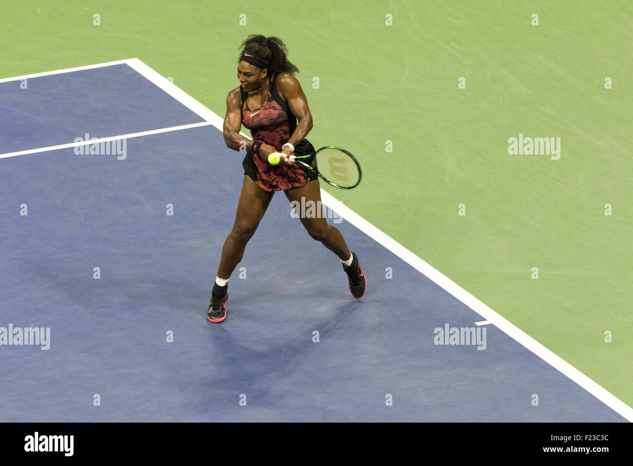 Serena williams in action against sister venus hires stock photography