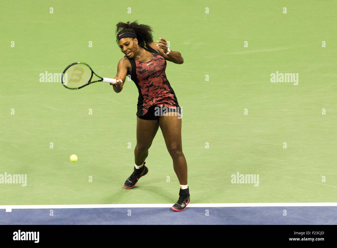 Serena williams in action against sister venus hires stock photography