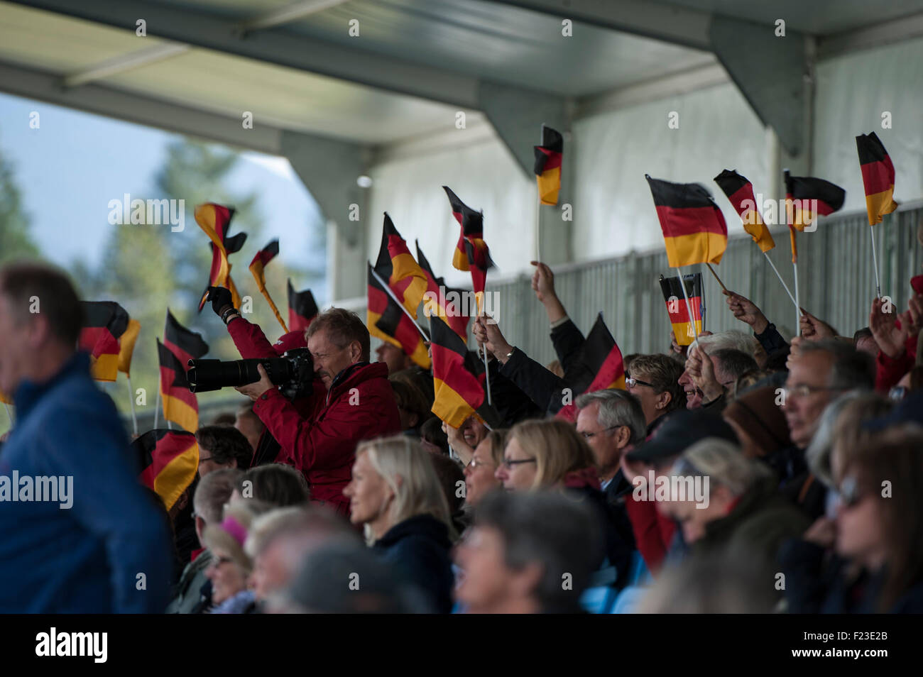 Blair Atholl, Scotland, UK. 10th September, 2015.  German fans celebrate after Michael Jung's [GER] dressage test on the first day.  The FEI European Eventing Championships 2015 Blair Castle Credit:  Stephen Bartholomew/Alamy Live News Stock Photo