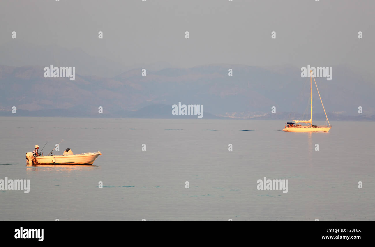Lonely fisherman boat sailing sea hi-res stock photography and images ...