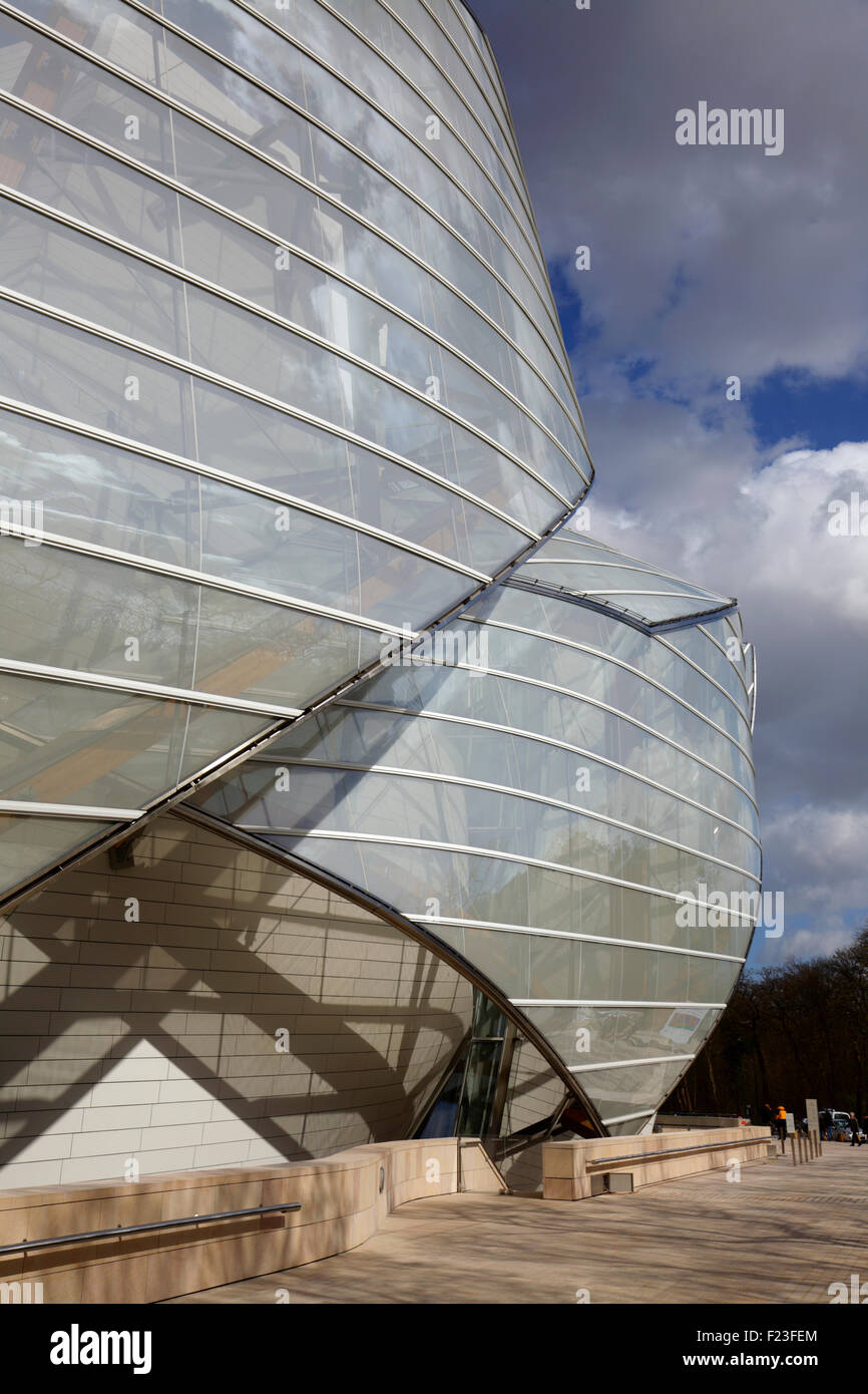 View of the Fondation Louis Vuitton museum, designed by Frank Gehry, with  colorful glass panes designed by Daniel Buren Stock Photo - Alamy