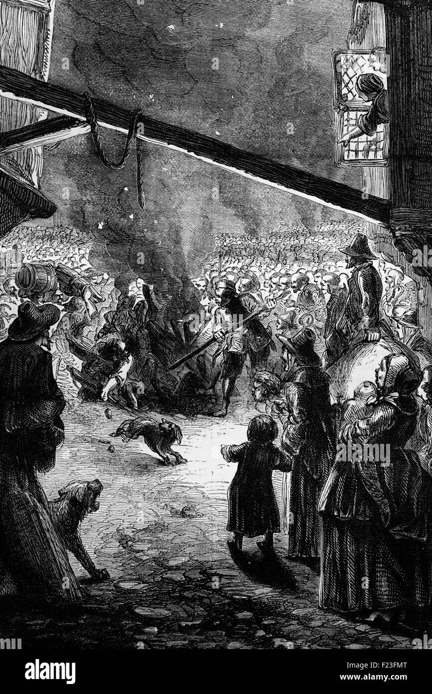 Crowds celebrating the death of Thomas Wentworth, 1st Earl of Strafford. From 1632 to 1639 he instituted a harsh rule as Lord Deputy of Ireland; he was recalled to England and impeached for 'high misdemeanors' regarding his conduct in Ireland and executed on Tower Hill, before a huge crowd on 12 May 1641. Stock Photo
