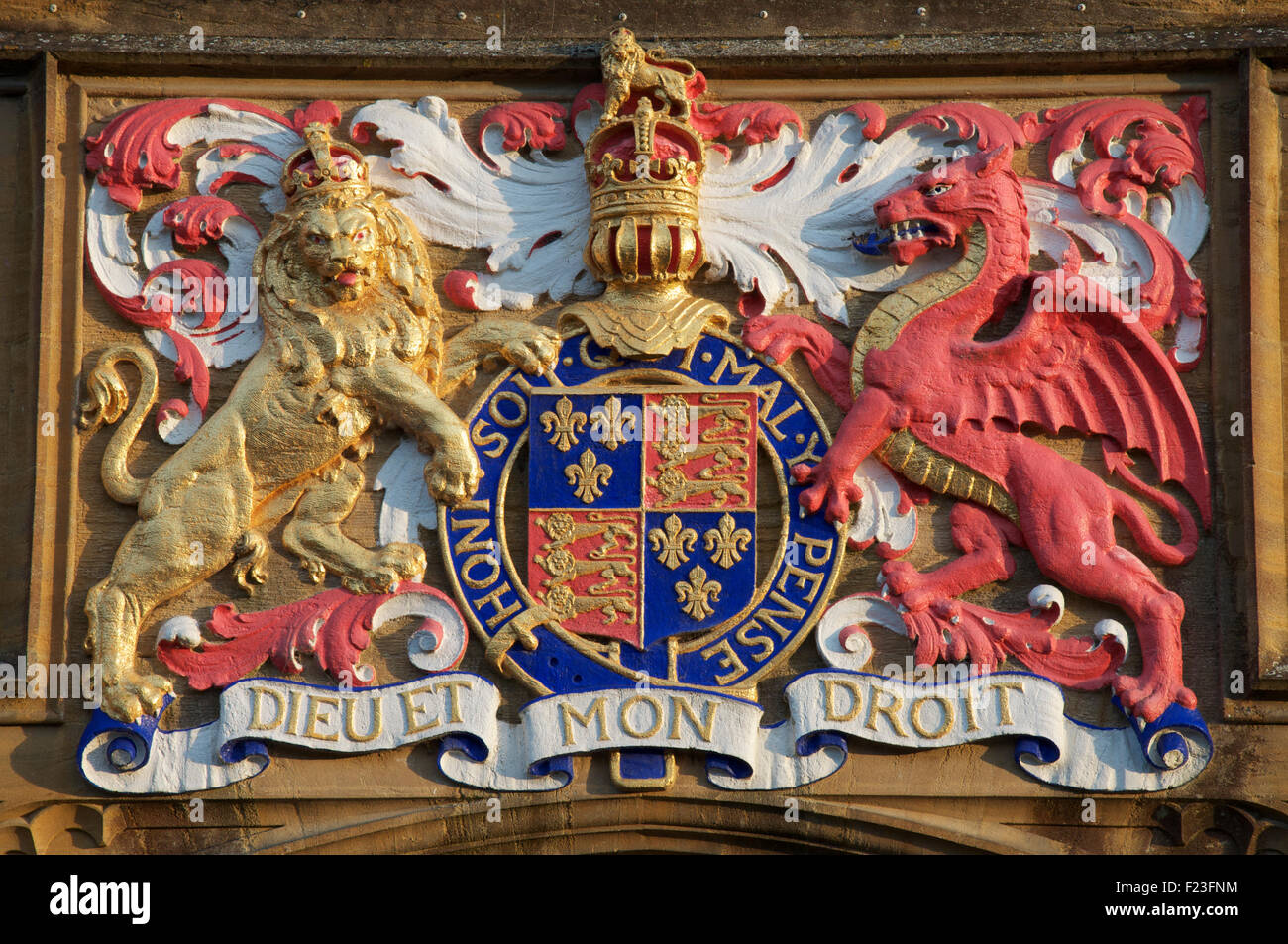 The Royal Coat of Arms of King Edward 6th above the entrance to Sherborne School, which was re-founded in his reign. Dorset, England, United Kingdom. Stock Photo