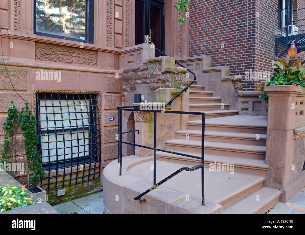 Brownstone apartment buildings, and staircase, New York Stock Photo
