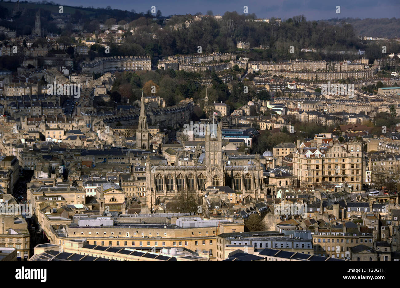 The city of Bath views, including abbey churchyard and the circus with tourist bus. a UK visit visitors cities 'Bath Abbey' Stock Photo