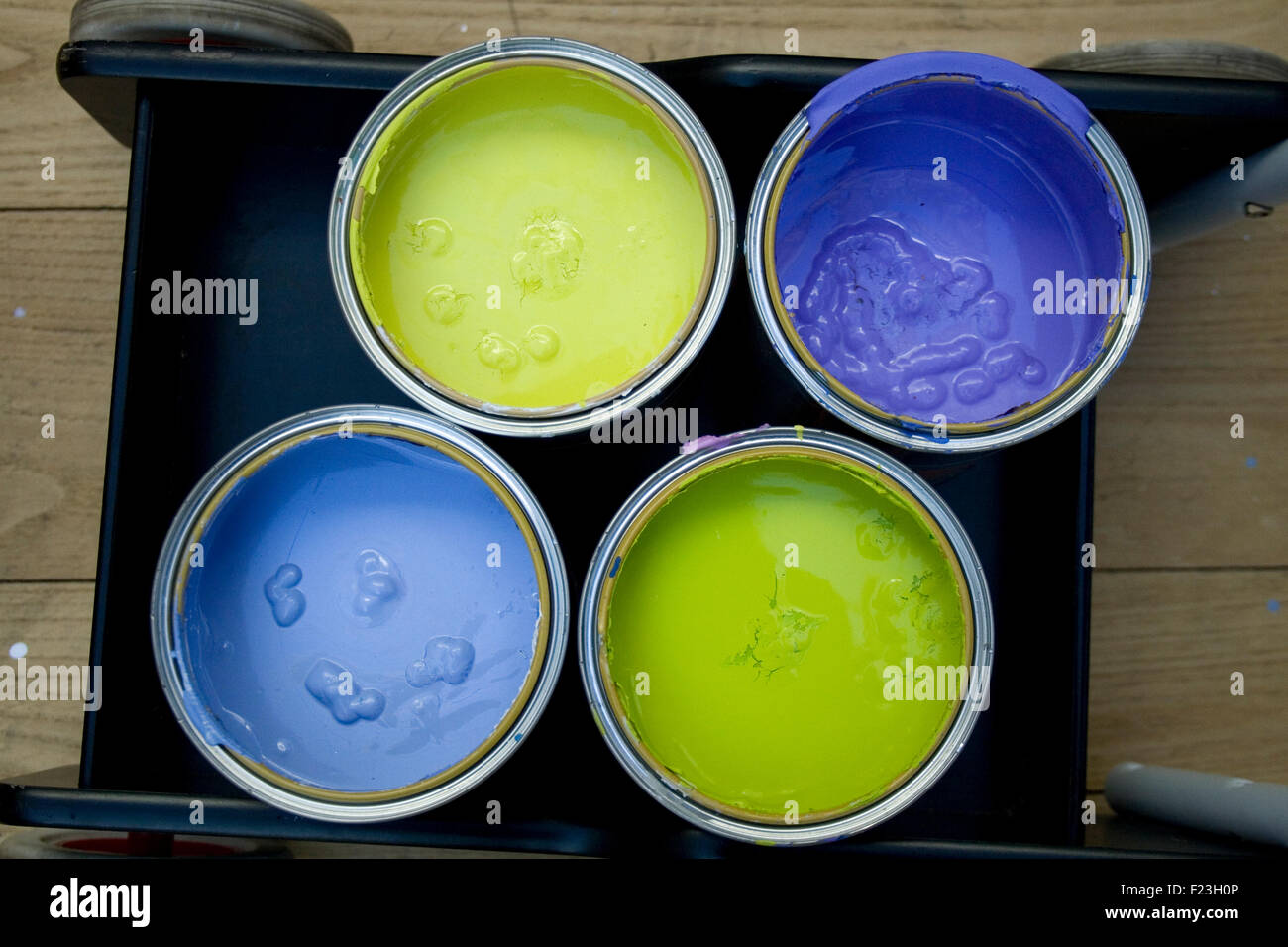 Four cans of various Colors Stock Photo
