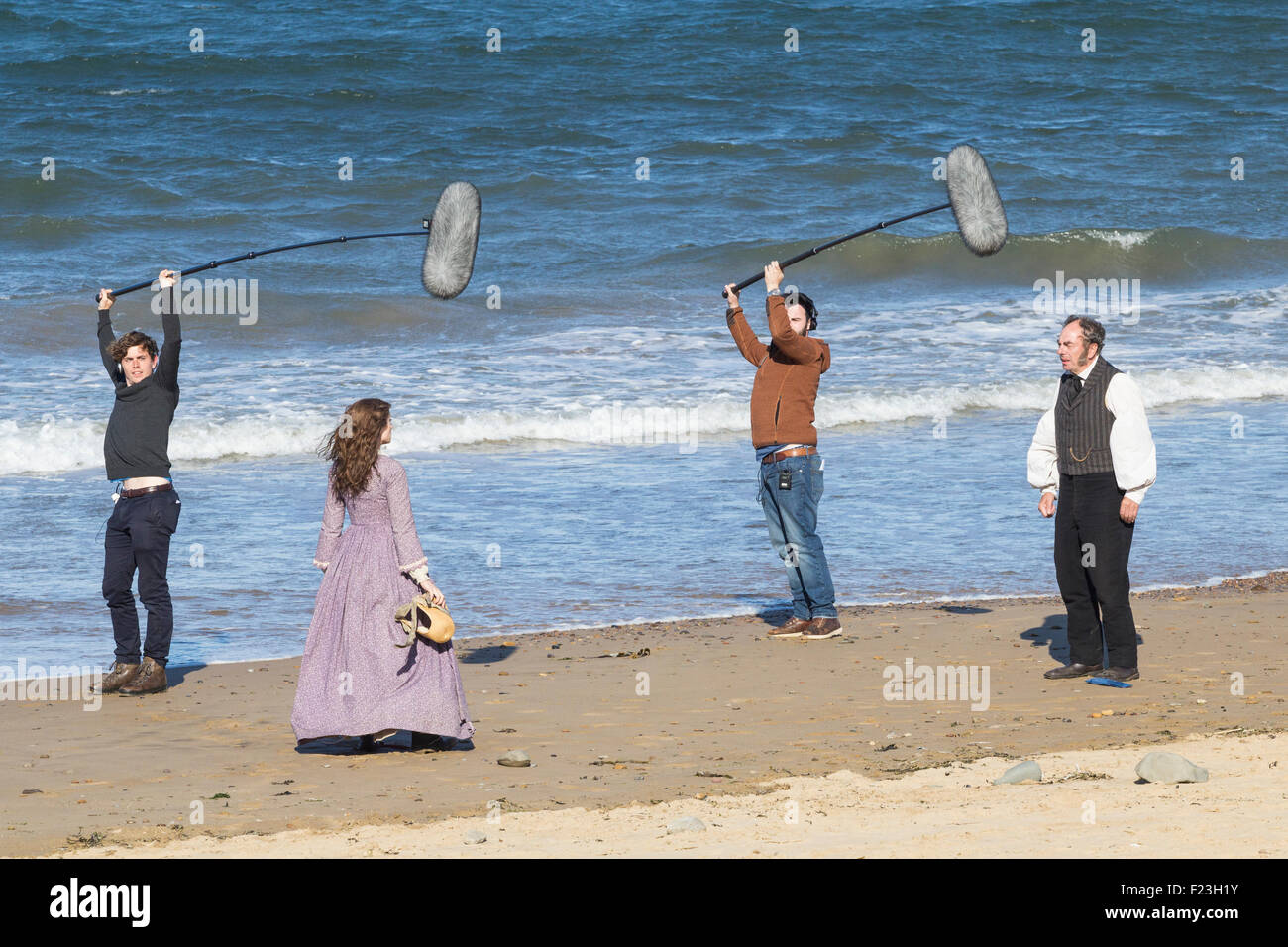 Saltburn by the sea, North Yorkshire, UK. 10th September, 2015. Weather: Actors on Saltburn beach ( Alun Armstrong, right, Joanne Froggatt, left ) filming new ITV drama Dark Angel in glorious weather on the North Yorkshire coast. Credit:  Alan Dawson News/Alamy Live News Stock Photo