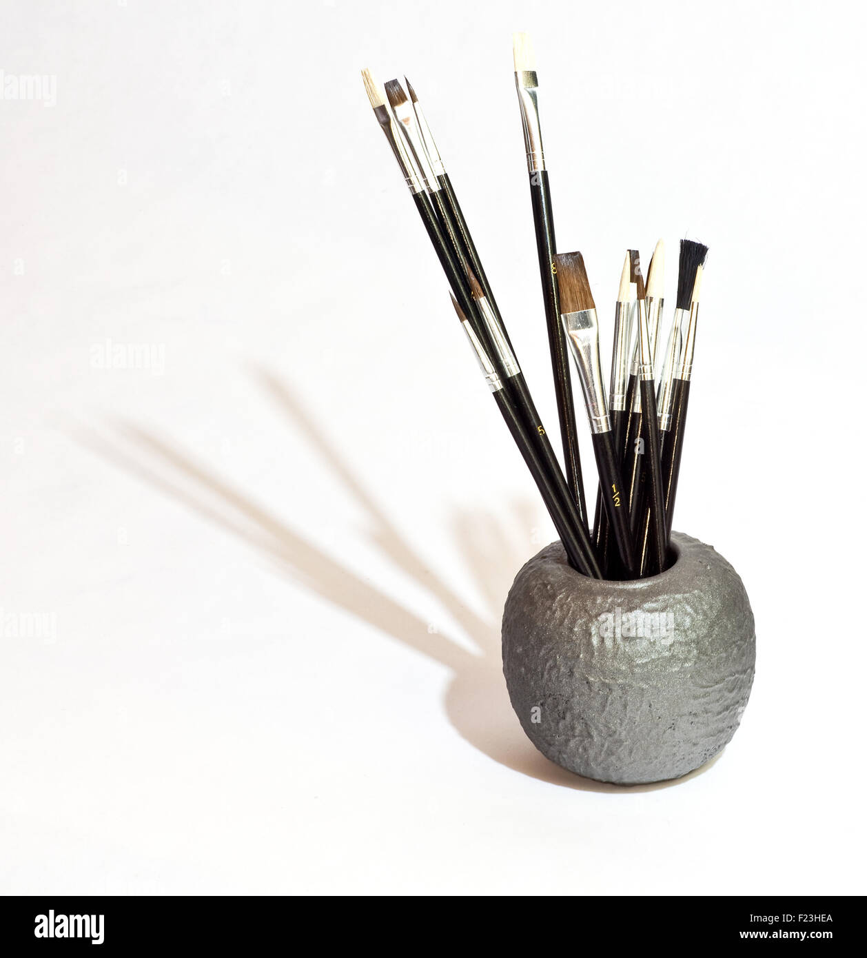 Various new Paintbrushes in a cup Stock Photo Alamy