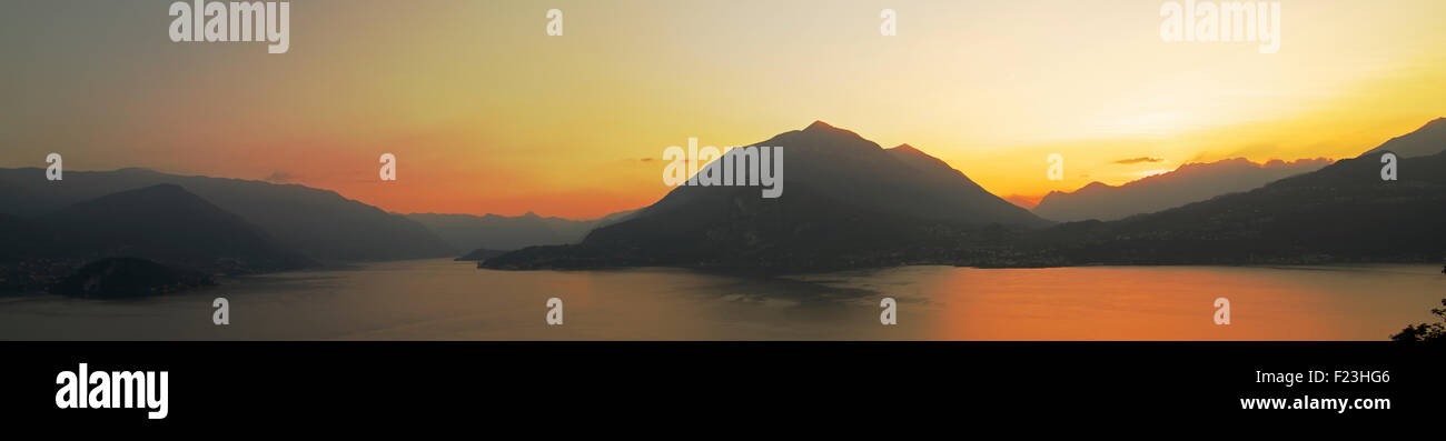 Panoramic view twilight over Lake Como Lombardy Italy Stock Photo
