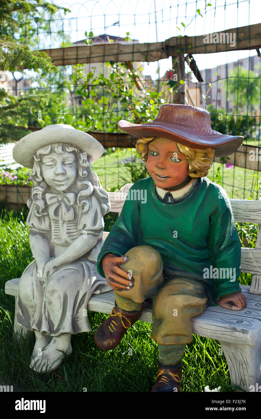 Painted statue in the garden Stock Photo Alamy