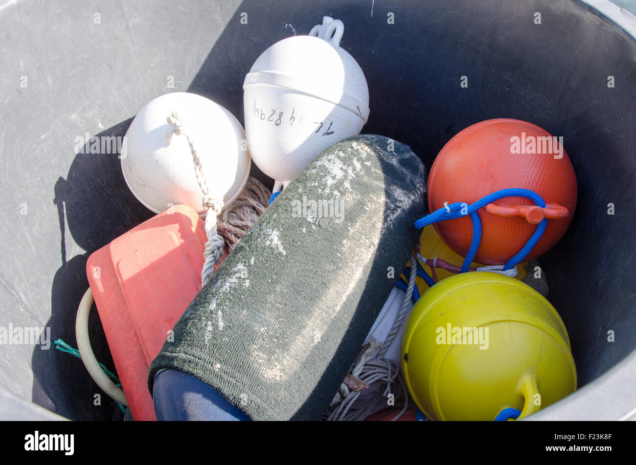 Colored buoys in a tray Stock Photo