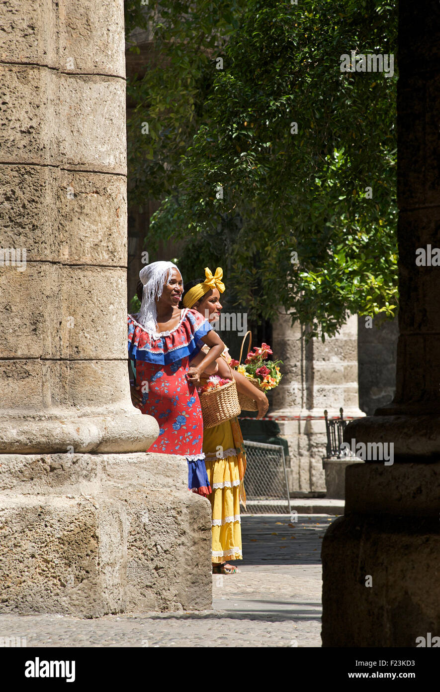 Cuban women in traditional festive costume outside the Palacio de los Capitanes Generales, Old Havana, Cuba Stock Photo