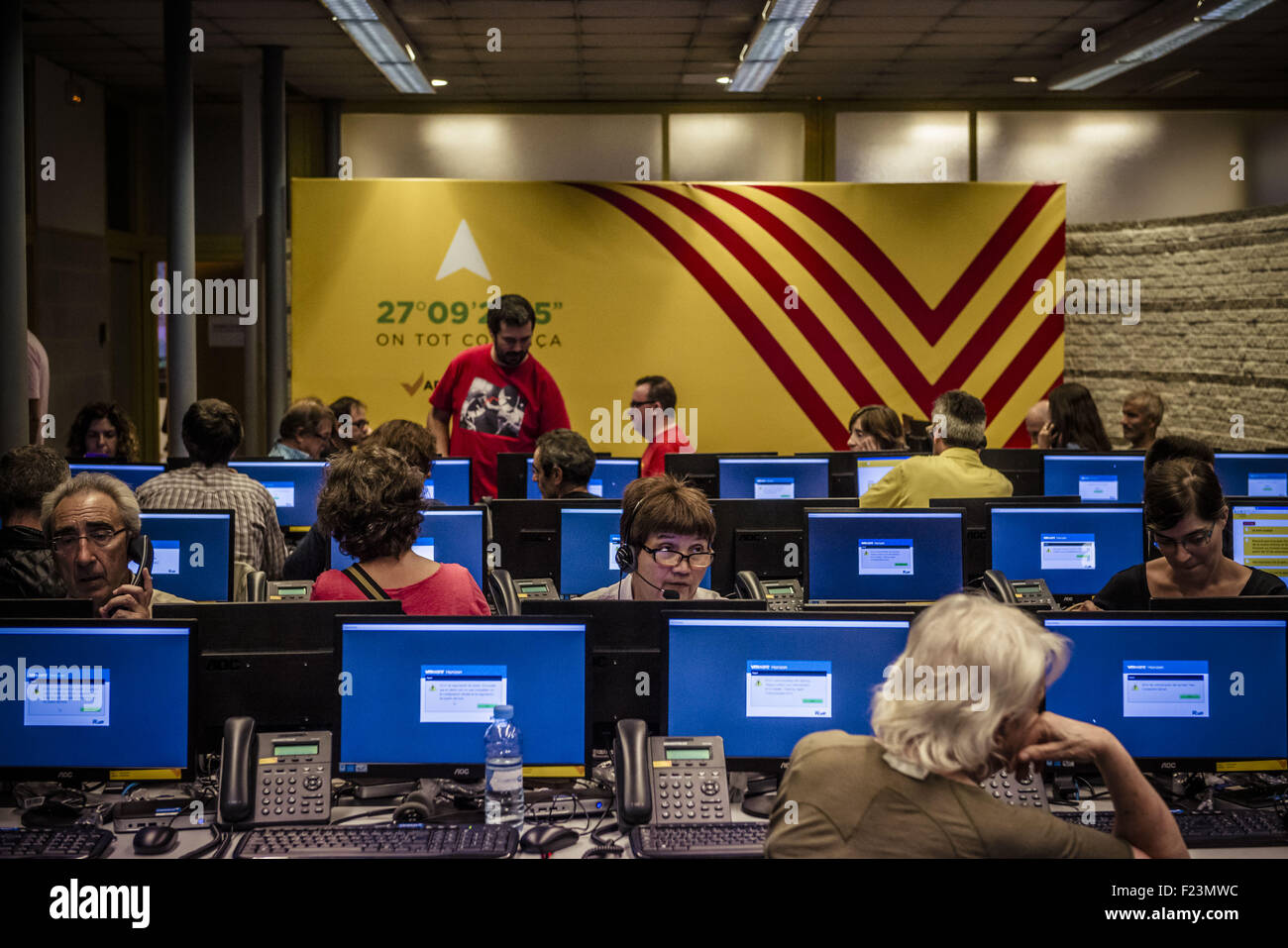 Barcelona, Catalonia, 10th 2015. Volunteers work in the 'Ara es l'Hora' call center to retrieve information over the atmospheric picture in the Catalan population regarding the independence Spain. Credit: