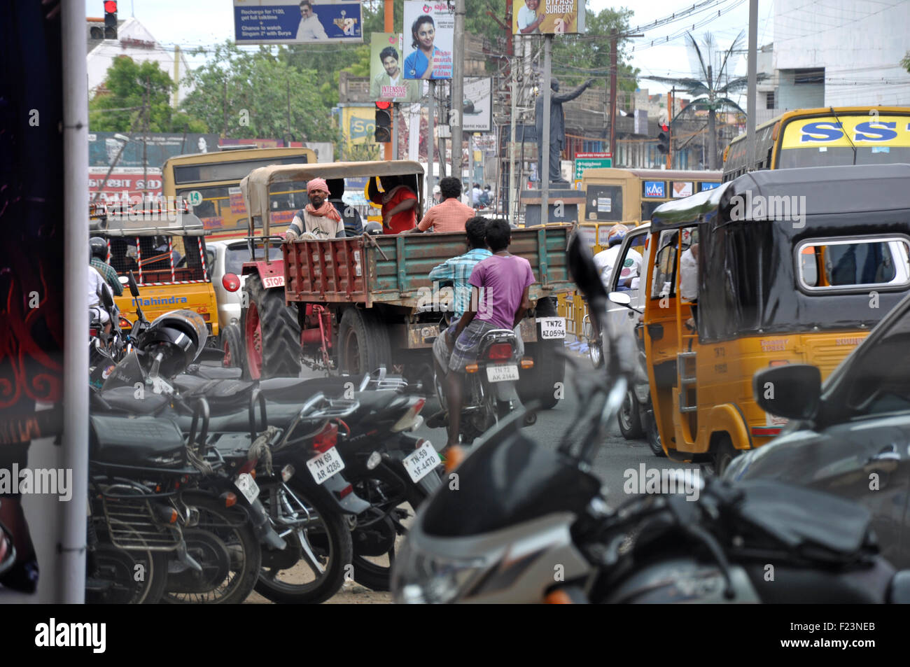 TAMIL NADU, INDIA, AUGUST 22, 2015: Traffic and pedestrians clash in the streets  in Tirunelveli, Tamil Nadu, India. Stock Photo