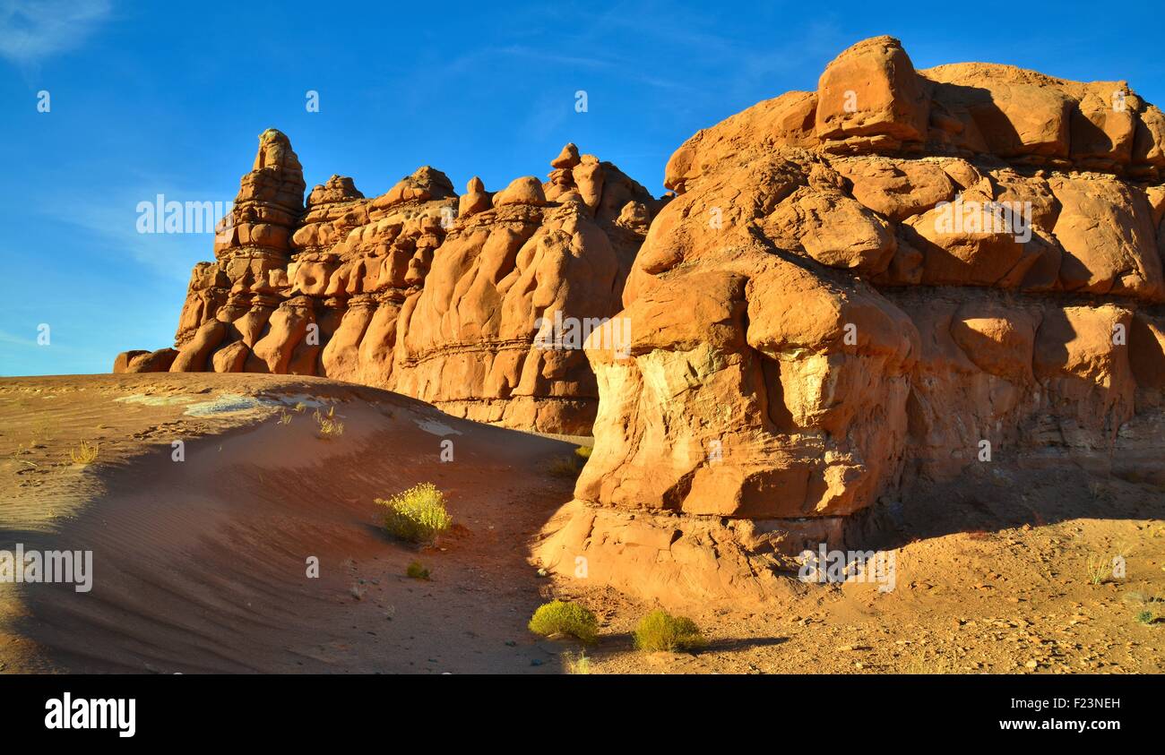 Castle like rock formations along Highway 24 near Hanksville, Utah, in the San Rafael desert. Stock Photo