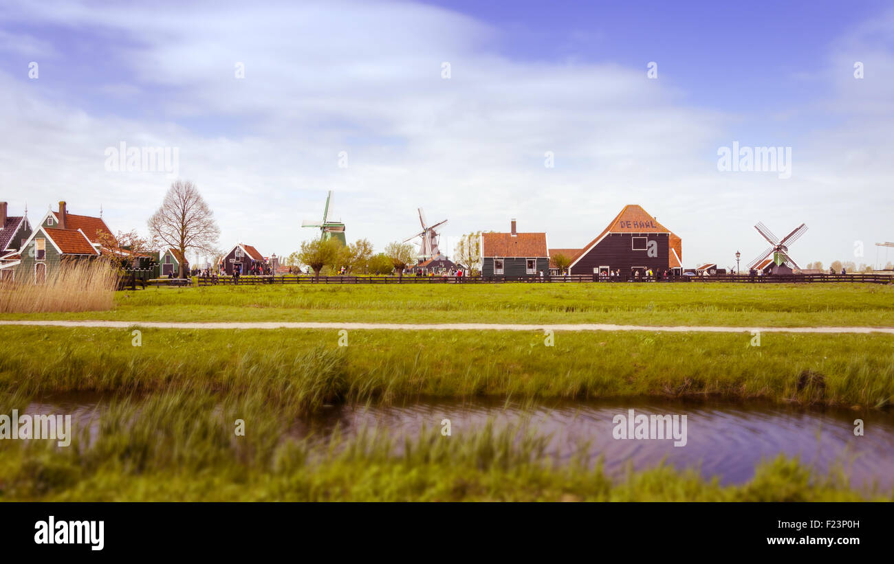 Windmills and rural houses in Zaanse Schans, Netherlands. Tilt-shift effect and Color filter effect Stock Photo