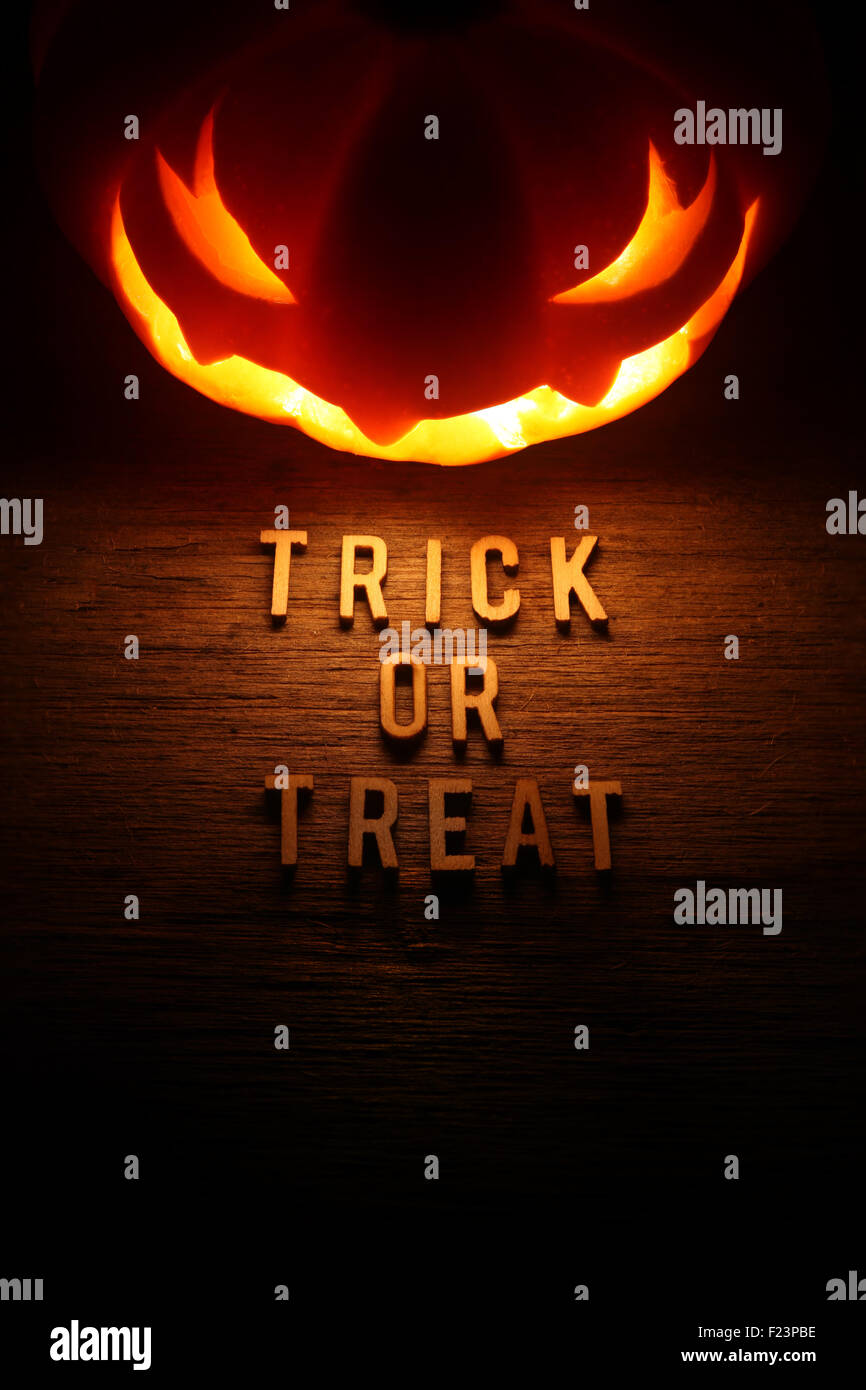 Spooky Halloween background with jack o lantern - Trick or Treat Stock Photo
