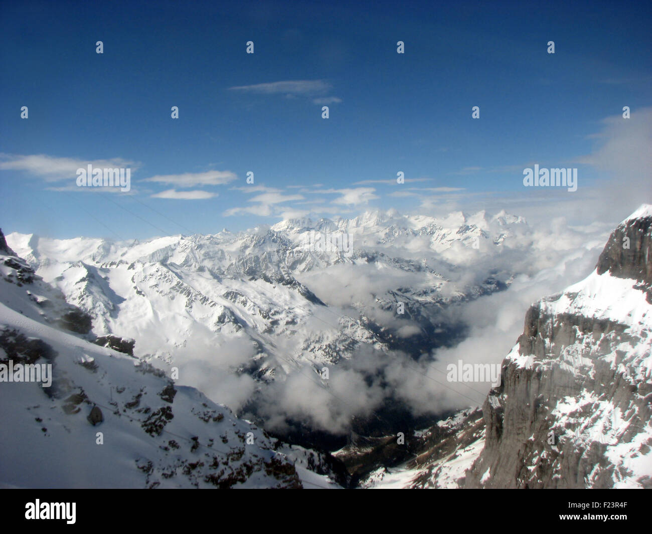 A birdseye view of the snowy peaks in the swiss alps. Stock Photo