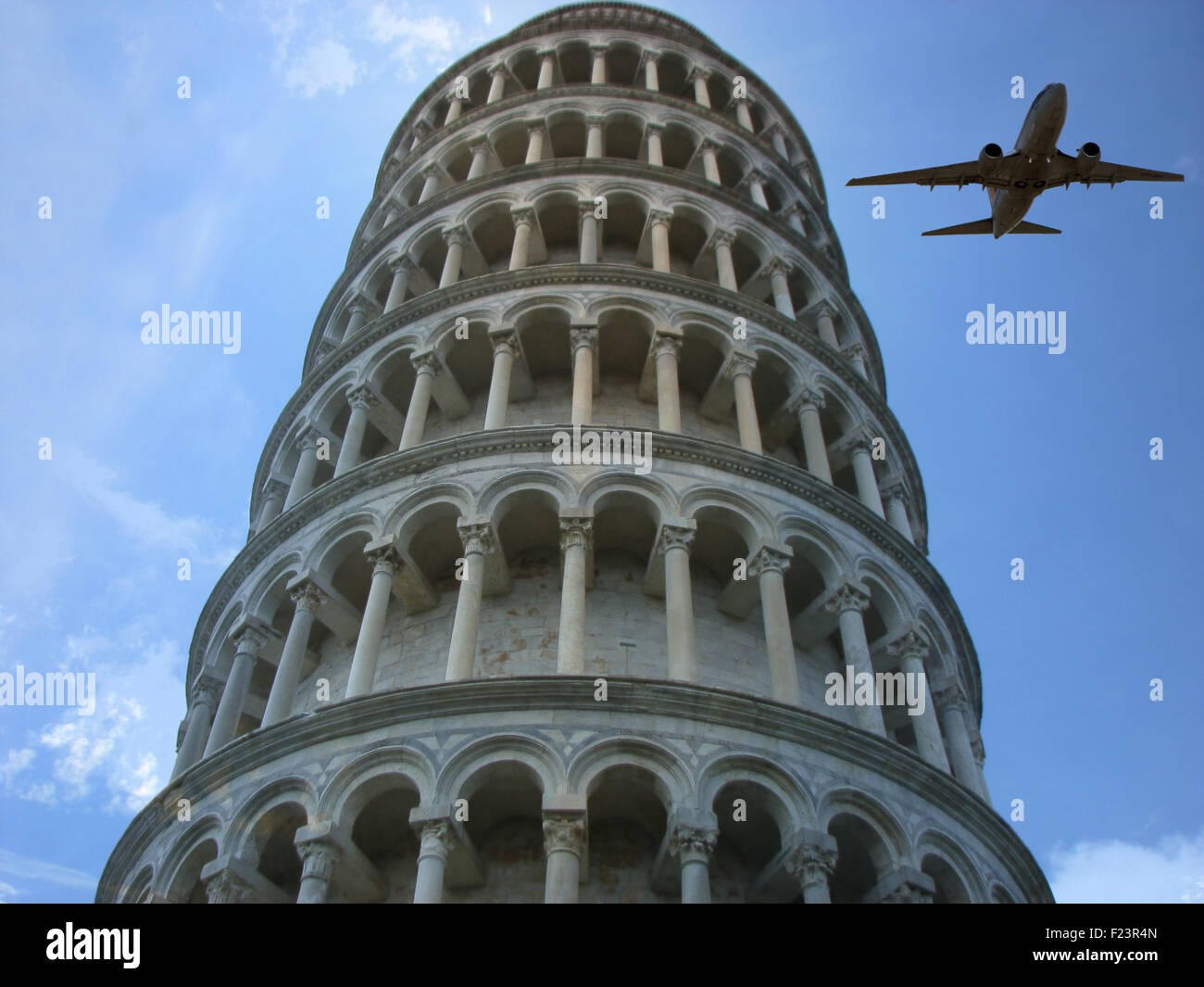 A metaphorical tourism image depicting an aeroplane flying past the leaning tower of Pisa, in Italy. Stock Photo
