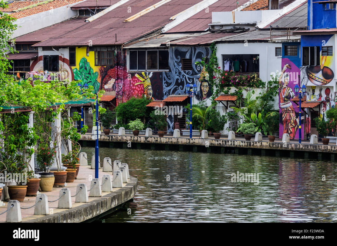 Brightly painted house fronts along the Malacca River, district of Kampung Bakar Batu, Malacca or Melaka, Malaysia Stock Photo