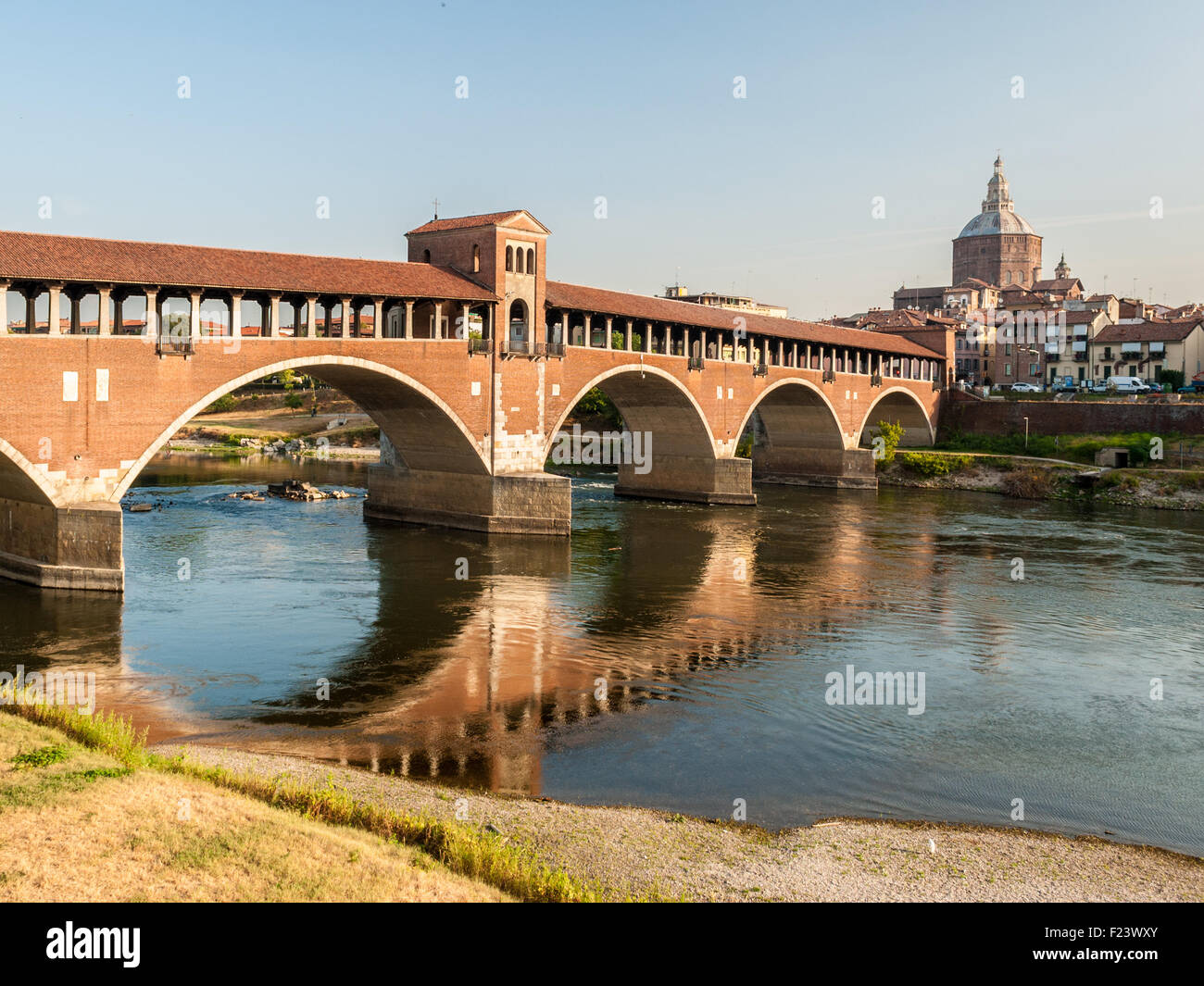 Skyline of Pavia, with 'Ponte Coperto' over the river Ticino Stock Photo