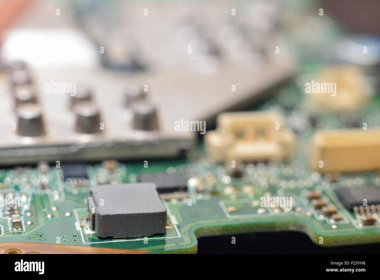 slots on matherboard (microcircuit) with microchip and radiators Stock Photo
