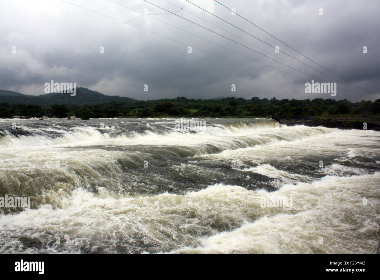 A background with a view of gushing water during the floods in India. Stock Photo
