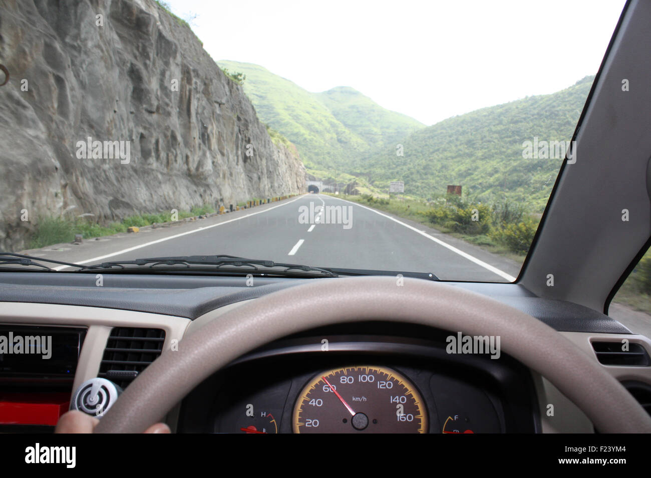 A speedometer of a car showing speed of 60 km per hour on a highway