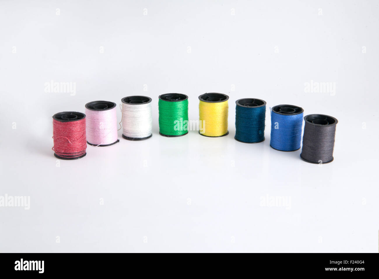 Roll thread used for sewing are available in various colors Stock Photo ...