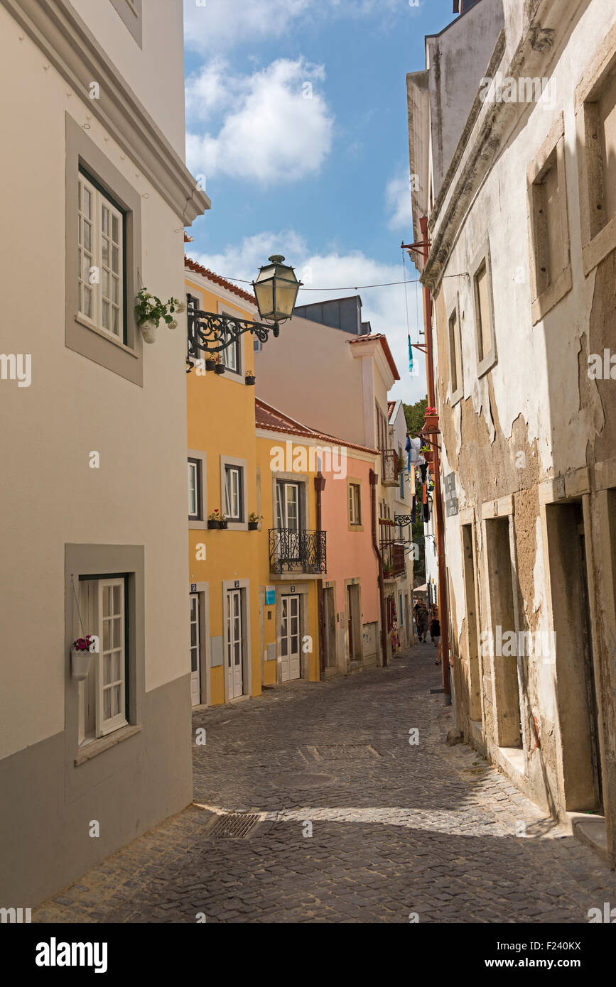Typical narrow street in Alfama Lisbon Portugal Stock Photo