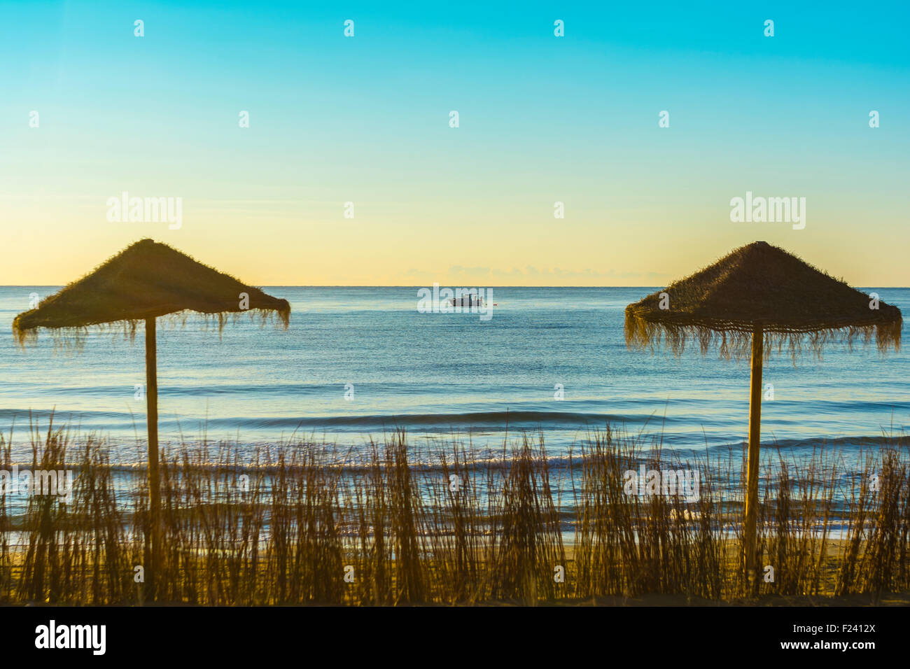 Umbrellas on the beach in Spain Stock Photo Alamy