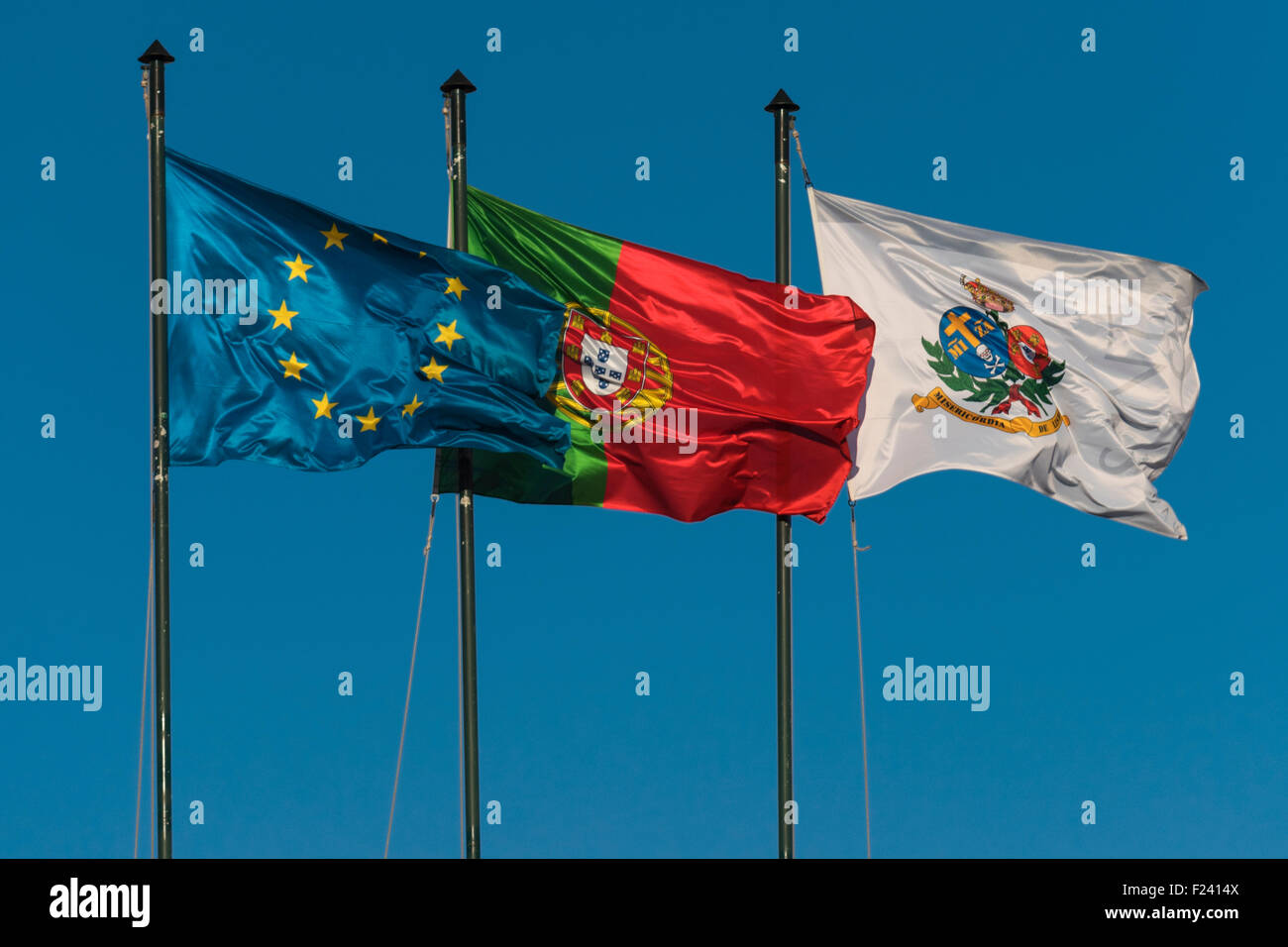 Three flags. EU, Portugal and Santa Casa da Misericordia de Lisboa. Lisbon Portugal Stock Photo