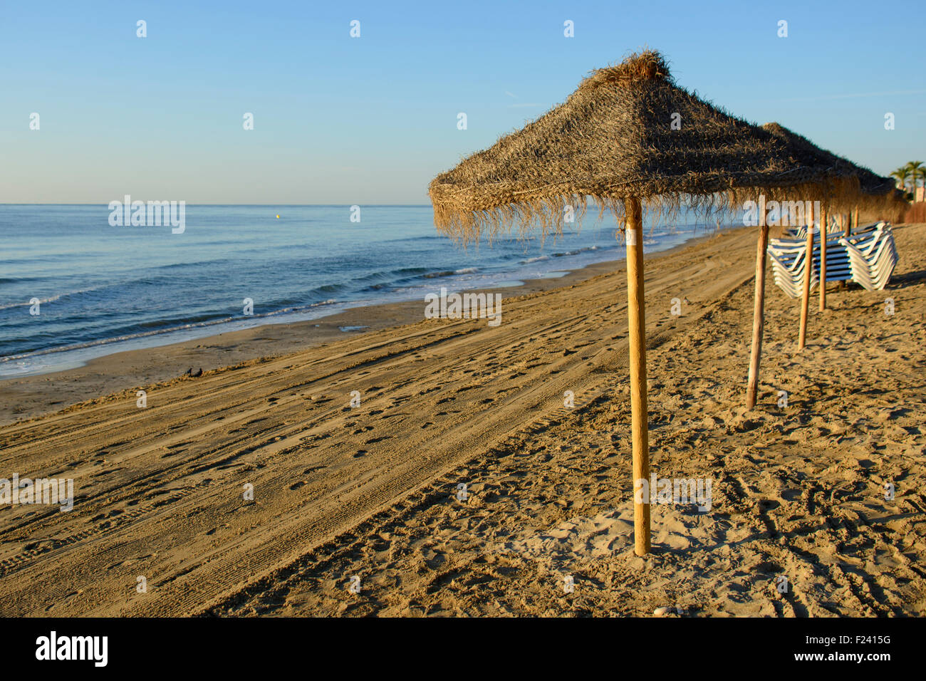 Umbrellas on the beach in Spain Stock Photo Alamy