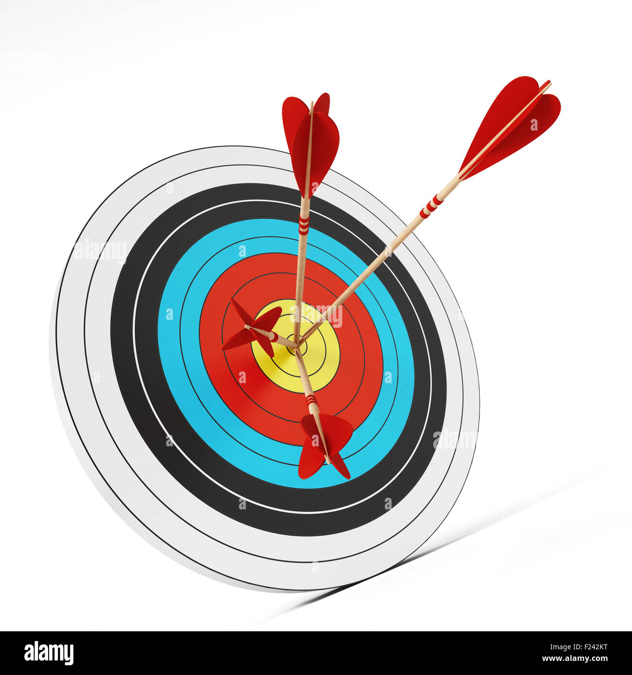 Three arrows at the center of the target. Stock Photo