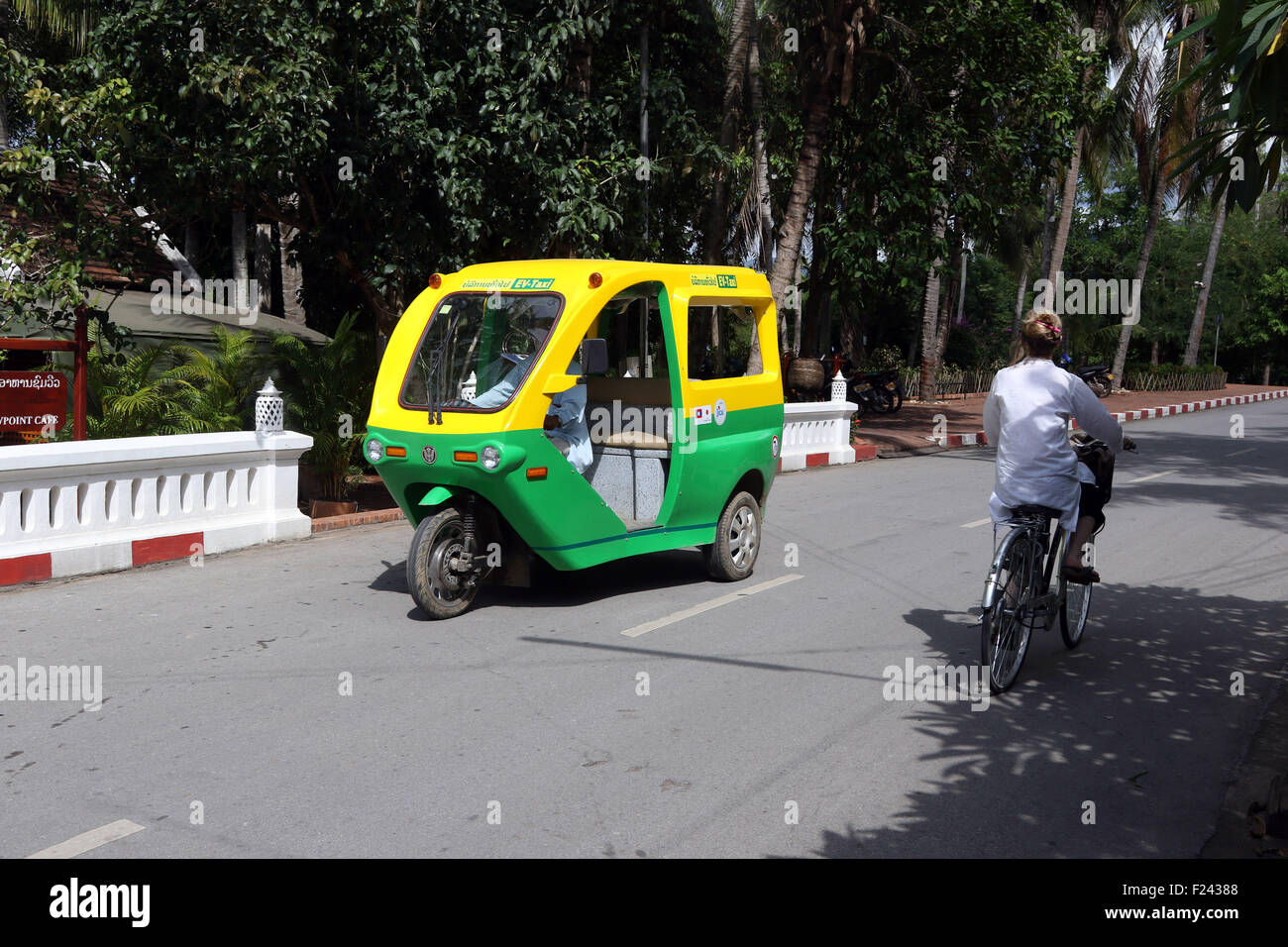 Electric tuktuk tuk tuk rickshaw green energy Stock Photo
