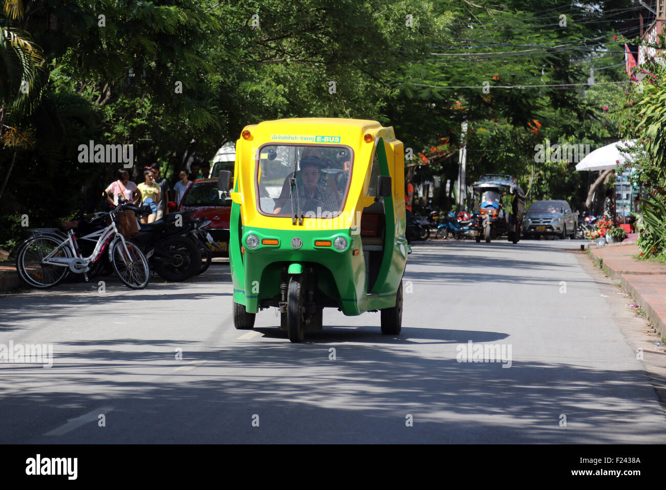 Electric tuktuk tuk tuk rickshaw green energy Stock Photo